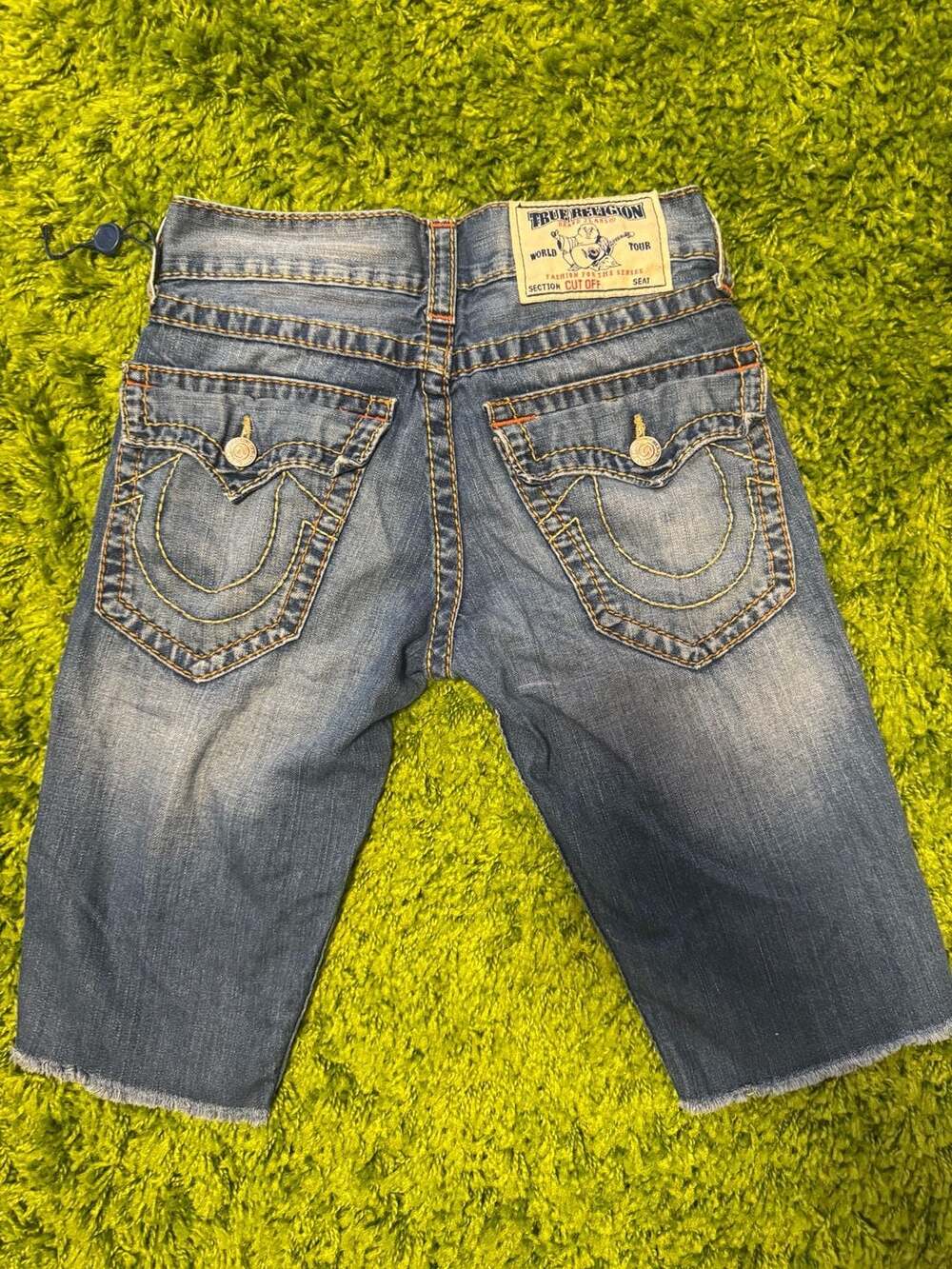 True Religion Big T Flap Straight Cutoff Distressed Denim Shorts